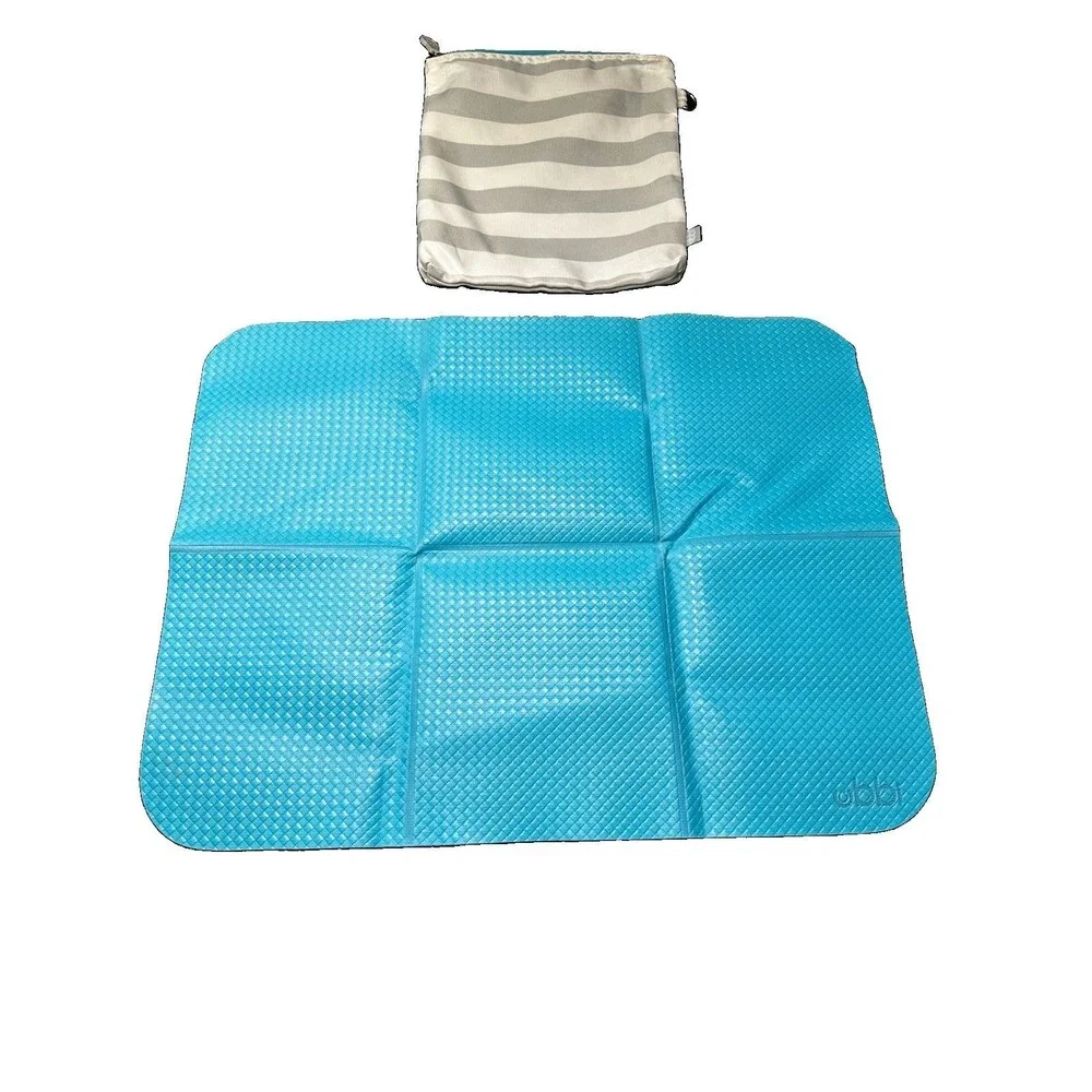 Ubbi On-The-Go Baby Diaper Changing Mat, Portable Foldable Travel Pad